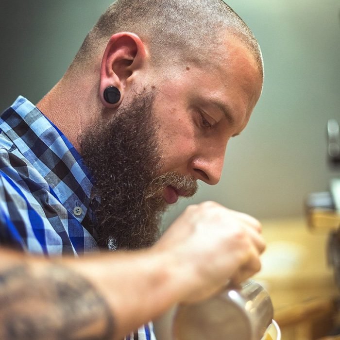 cafe photography of a barista preparing a coffee